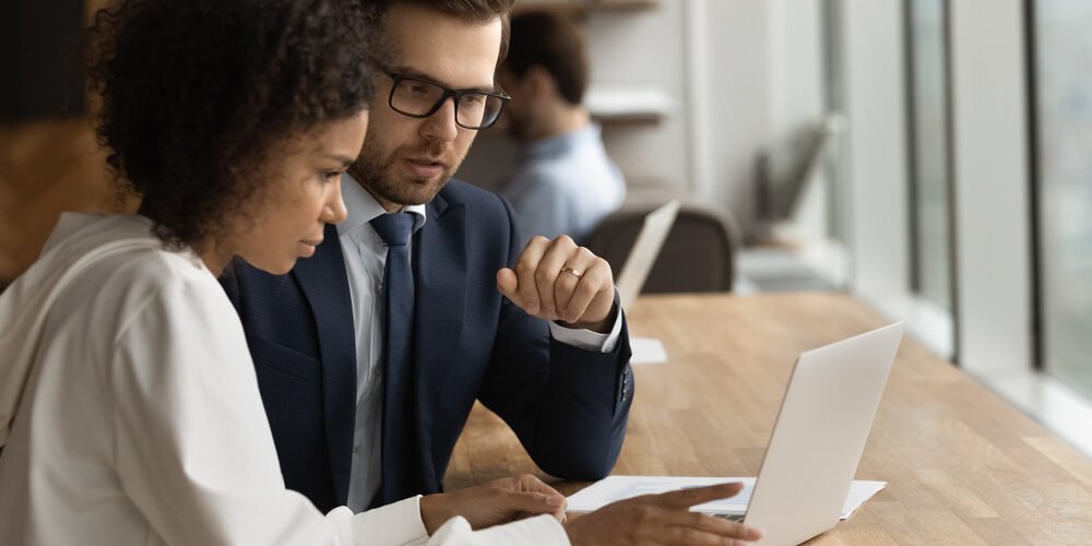 Close,Up,Diverse,Colleagues,Working,On,Online,Project,Together,,Discussing